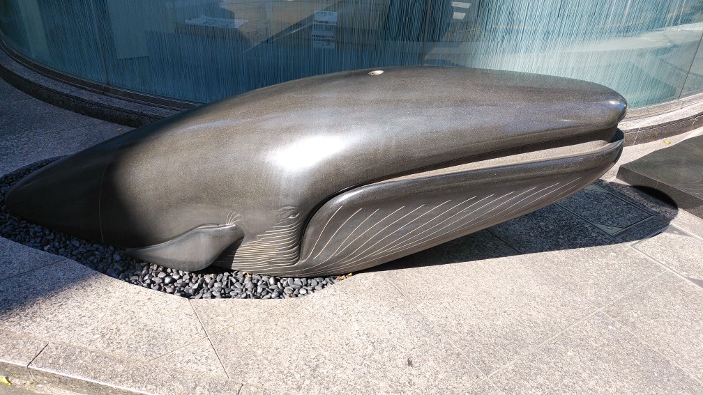 A whale appeared on the street corner. The Karakuri Clock is a symbol tower of Ningyocho.